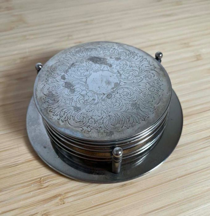 Set of Silver-plated stackable drink coasters